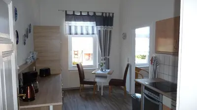 Küche/Küchenzeile in der Unterkunft City-Ferienwohnung-Blankenburg