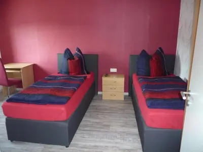 Ein Bett oder Betten in einem Zimmer der Unterkunft Harzurlaub