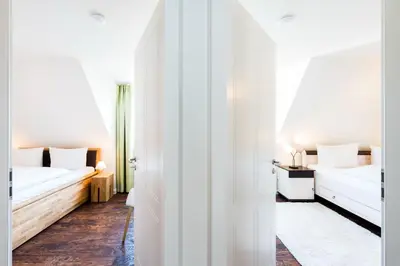 Ein Bett oder Betten in einem Zimmer der Unterkunft Zum fröhlichen Tagelöhner
