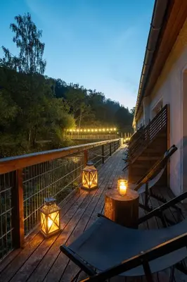 Ein Balkon oder eine Terrasse in der Unterkunft BODETALER BASECAMP LODGE - Naturerlebnis Lodge