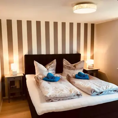 Ein Bett oder Betten in einem Zimmer der Unterkunft Ferienhaus Ilfeld
