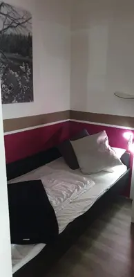 Ein Bett oder Betten in einem Zimmer der Unterkunft Hahnenklee Ferienpark 1-411