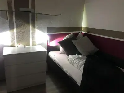 Ein Bett oder Betten in einem Zimmer der Unterkunft Hahnenklee Ferienpark 1-411