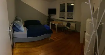 Ein Sitzbereich in der Unterkunft Monteurs Zimmer Noack