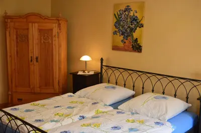 Ein Bett oder Betten in einem Zimmer der Unterkunft Quartier am Brunnen