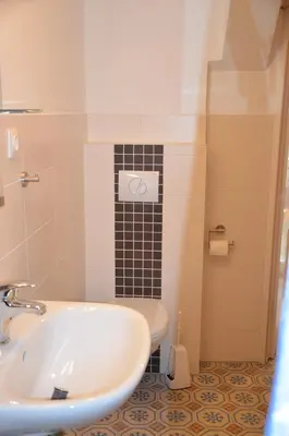 Ein Badezimmer in der Unterkunft Quartier am Brunnen