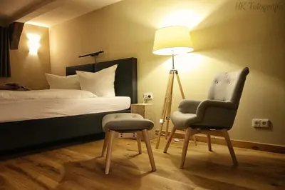 Ein Bett oder Betten in einem Zimmer der Unterkunft Hotel Fairista Quedlinburg
