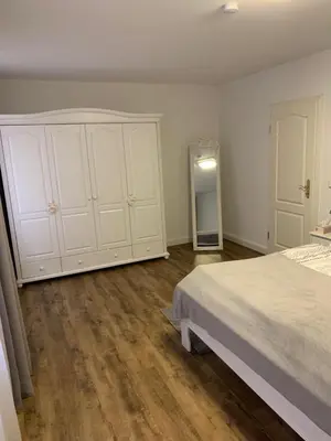 Ein Bett oder Betten in einem Zimmer der Unterkunft Ecke - der Romanik
