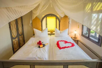 Ein Bett oder Betten in einem Zimmer der Unterkunft Prinzessinnenturm
