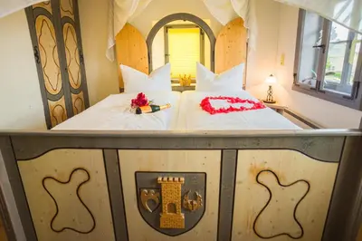 Ein Bett oder Betten in einem Zimmer der Unterkunft Prinzessinnenturm