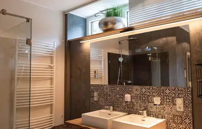 Ein Badezimmer in der Unterkunft StrandBerg's Auberge Chalet Residences