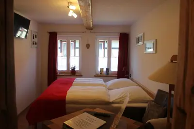 Ein Bett oder Betten in einem Zimmer der Unterkunft Ferienwohnung Altstadtidylle 2