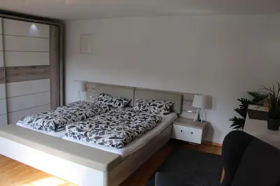 Ein Bett oder Betten in einem Zimmer der Unterkunft Ferienwohnung Villa Großer Bleek