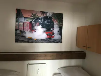 Ein Bett oder Betten in einem Zimmer der Unterkunft App 613 Panoramic Hohegeiß Terrassenhaus
