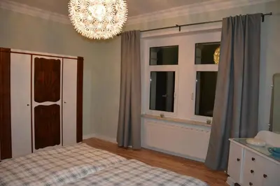 Ein Bett oder Betten in einem Zimmer der Unterkunft Villa Heimburg