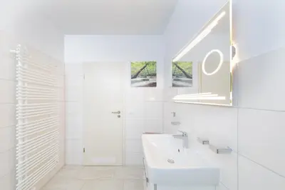 Ein Badezimmer in der Unterkunft Harzer-Bachtaeler