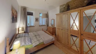 Ein Bett oder Betten in einem Zimmer der Unterkunft Ihr Zuhause am Jakobikirchhof