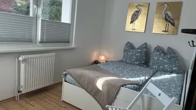 Ein Bett oder Betten in einem Zimmer der Unterkunft Ferienwohnungen am Köhlerhang Bad Lauterberg im Harz