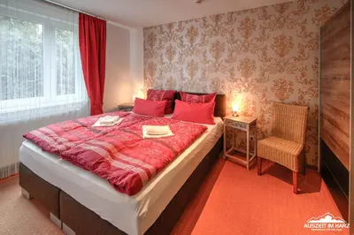 Ein Bett oder Betten in einem Zimmer der Unterkunft Auszeit-im-Harz Haus 6 Wohnung 3