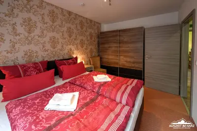 Ein Bett oder Betten in einem Zimmer der Unterkunft Auszeit-im-Harz Haus 6 Wohnung 3