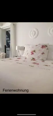 Ein Bett oder Betten in einem Zimmer der Unterkunft Reikistudio Venedig