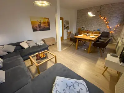 Ein Sitzbereich in der Unterkunft Ferienwohnung am Anger