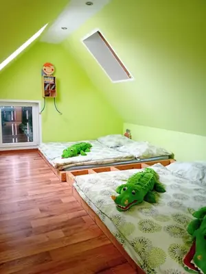 Ein Bett oder Betten in einem Zimmer der Unterkunft Villa Windschief