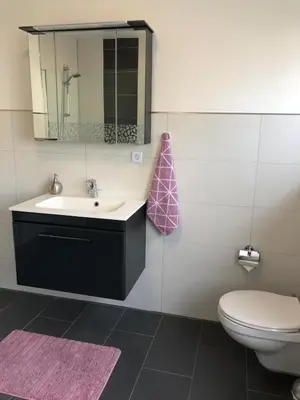 Ein Badezimmer in der Unterkunft International 2