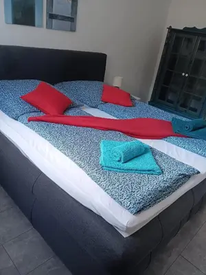 Ein Bett oder Betten in einem Zimmer der Unterkunft International 2