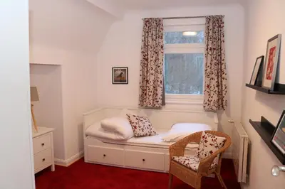 Ein Bett oder Betten in einem Zimmer der Unterkunft Villa Elfenstein