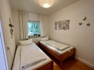 Ein Bett oder Betten in einem Zimmer der Unterkunft Platell Ferienhausverwaltung Sankt Andreasberg