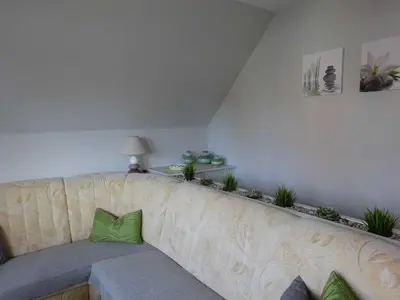 Ein Sitzbereich in der Unterkunft Ferienhaus Cramer
