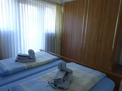 Ein Bett oder Betten in einem Zimmer der Unterkunft Ferienhaus Cramer