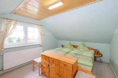 Ein Bett oder Betten in einem Zimmer der Unterkunft Ferienhaus 