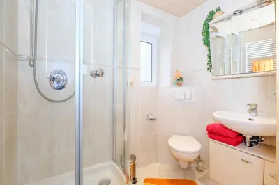 Ein Badezimmer in der Unterkunft Ferienhaus 