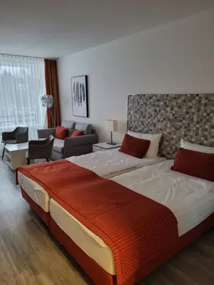 Ein Bett oder Betten in einem Zimmer der Unterkunft Apartment mit Seeblick Vier Jahreszeiten