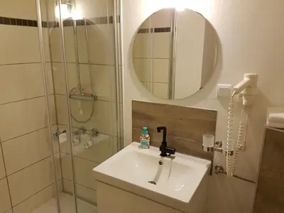 Ein Badezimmer in der Unterkunft Apartment mit Seeblick Vier Jahreszeiten