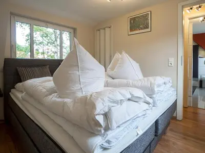 Ein Bett oder Betten in einem Zimmer der Unterkunft Ferienhaus Holtemme in Wernigerode