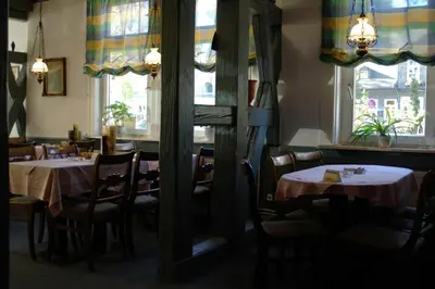 Ein Restaurant oder anderes Speiselokal in der Unterkunft Gästehaus Verhoeven