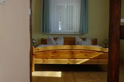 Ein Bett oder Betten in einem Zimmer der Unterkunft Gästehaus Verhoeven