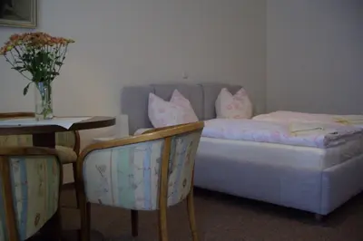 Ein Bett oder Betten in einem Zimmer der Unterkunft Gästehaus Verhoeven