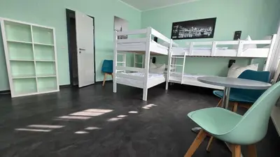 Ein Bett oder Betten in einem Zimmer der Unterkunft Harz Hostel