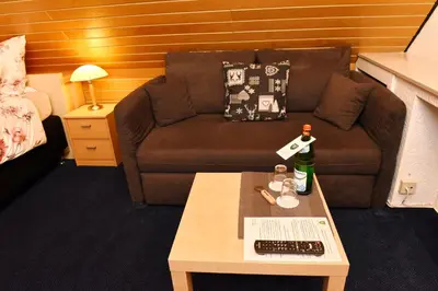 Ein Sitzbereich in der Unterkunft Hotel Wappenhof