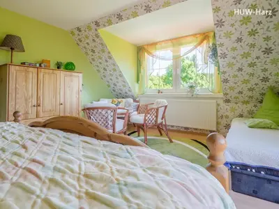 Ein Bett oder Betten in einem Zimmer der Unterkunft Idyllisches Ferienhaus bei Wernigerode