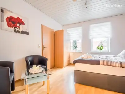 Ein Bett oder Betten in einem Zimmer der Unterkunft Ruhiges Apartment am Waldrand mit Schlossblick