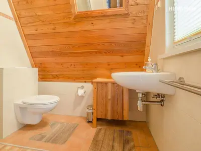 Ein Badezimmer in der Unterkunft Finnhütte am Kapitelsberg