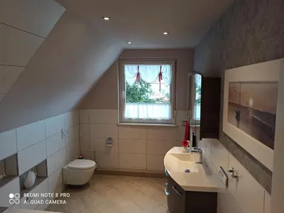 Ein Badezimmer in der Unterkunft Ferienwohnung 