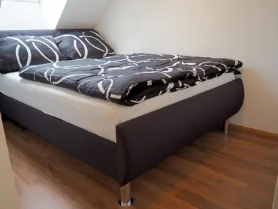 Ein Bett oder Betten in einem Zimmer der Unterkunft Moderne Ferienwohnung Salzbergstraße in Wernigerode