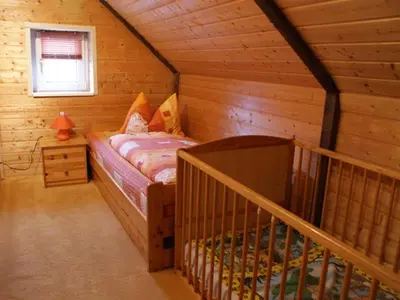 Ein Bett oder Betten in einem Zimmer der Unterkunft Ferienhaus Bein