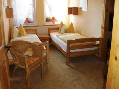 Ein Bett oder Betten in einem Zimmer der Unterkunft Ferienhaus Bein